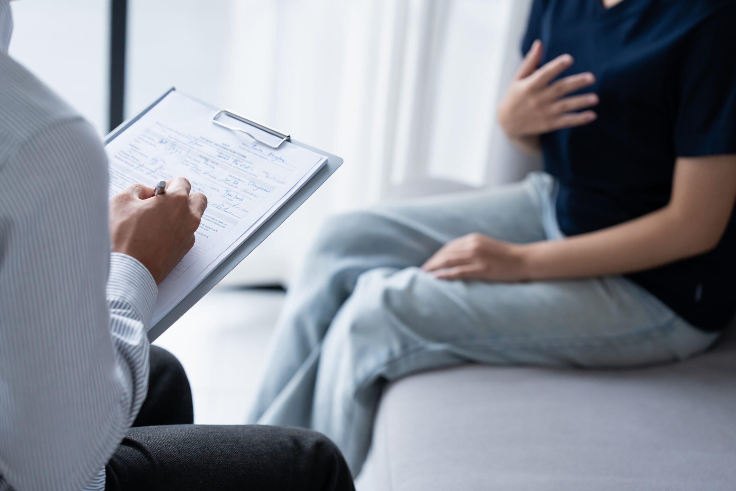 Sad,Female,Sitting,On,Sofa,Patient,Discussing,Mental,Health,Issues